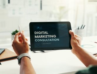 Business person, hands and tablet screen for marketing, advertising or promotion at creative startu.